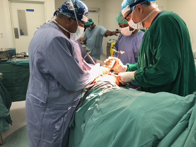 Dr Brazel operating in the theatre in Fiji